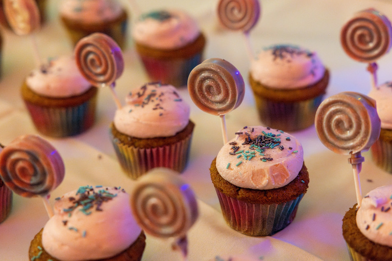 Pink frosted cupcakes to represent Glinda and the munchkins for the LWTC Wizard of Oz theme