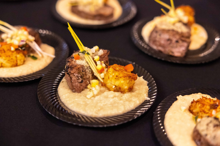 plate of food with meat corn and grits