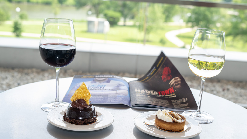 A glass of red wine, a glass of white wine, and two seasonal desserts on the Hancher balcony while you review the show schedule for the year. What's not to love?