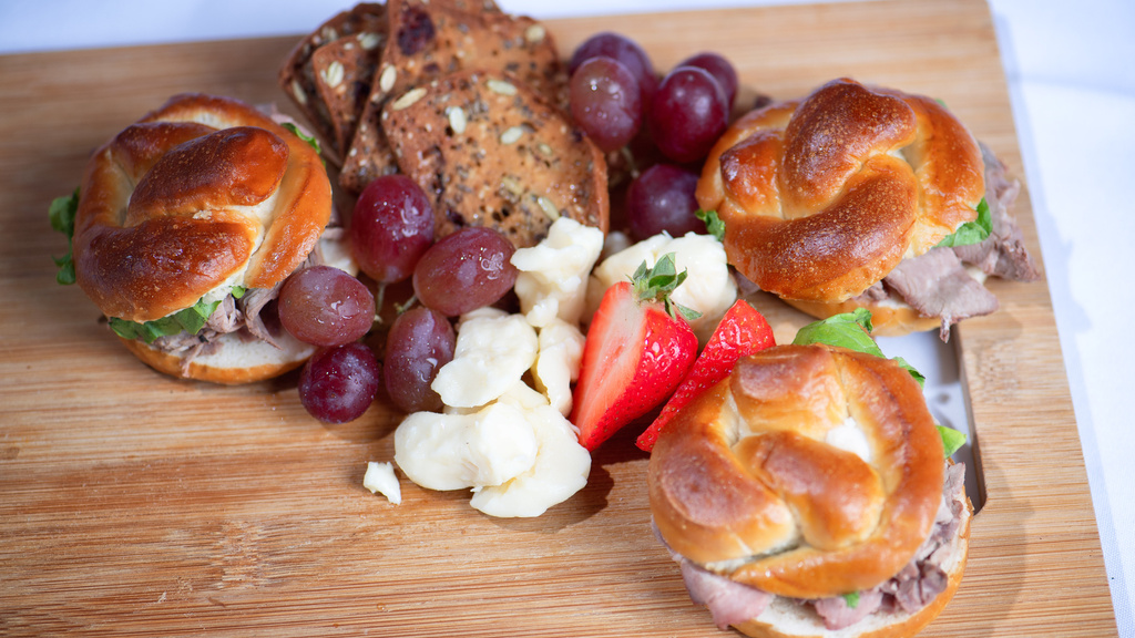 sandwiches and grapes on platter
